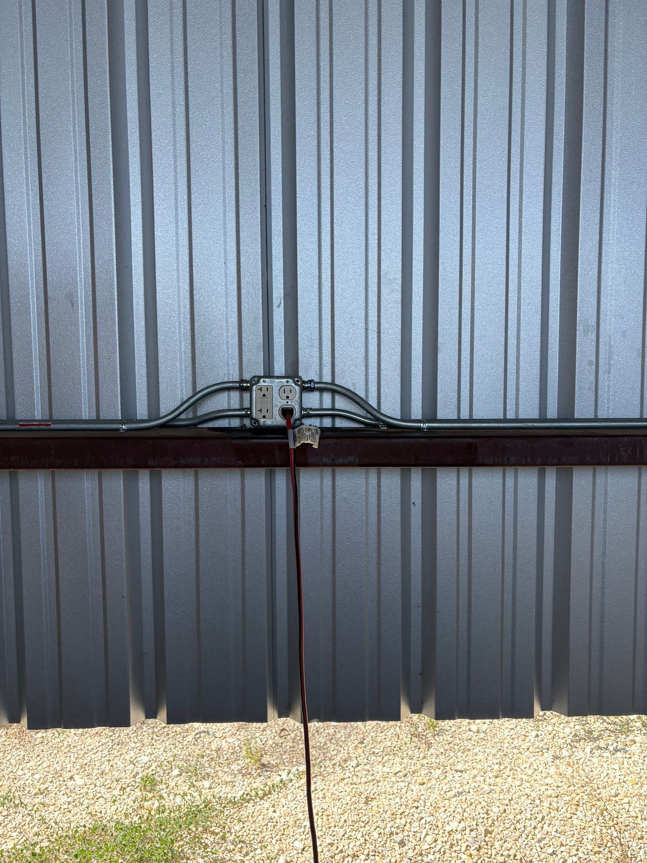 Conduit and outlet installation on metal building by Tristar Services LLC