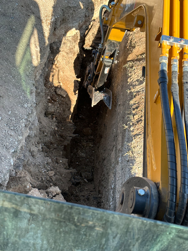 Rocksaw trenching — Tristar Services LLC